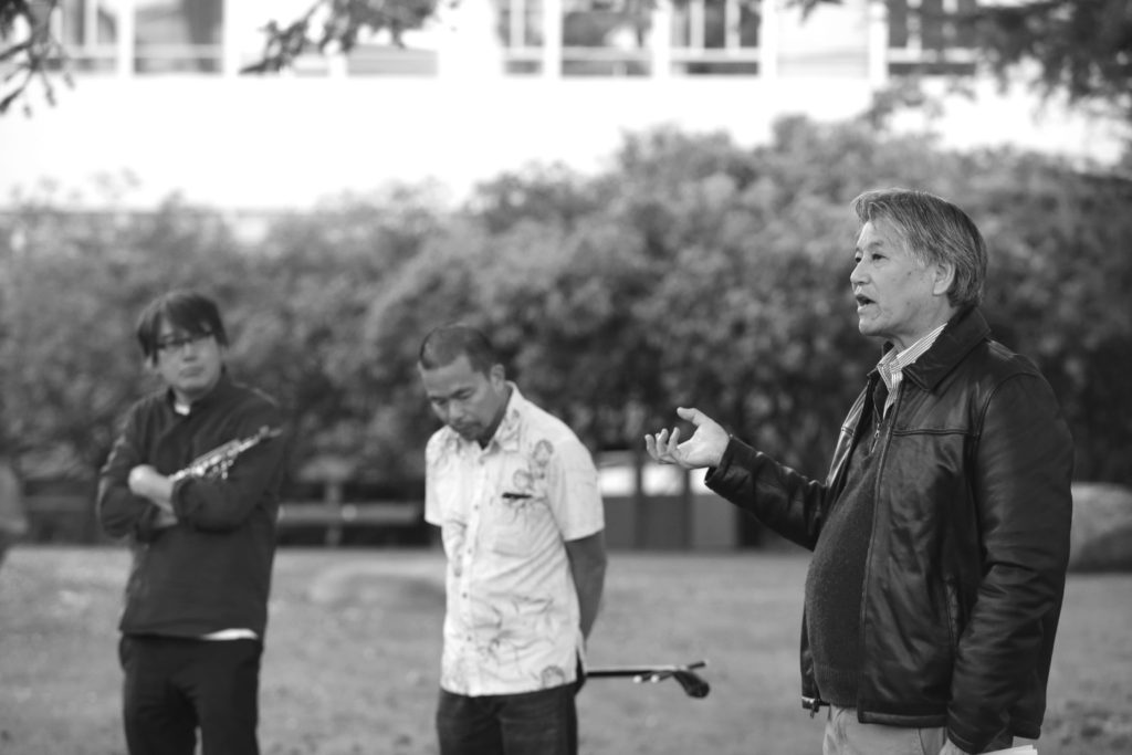 Michael Yoshii speaking to event attendees