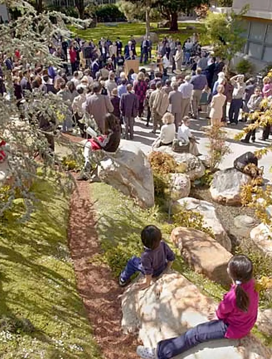 Aerial shot of people congregated in the Garden of Remembrance